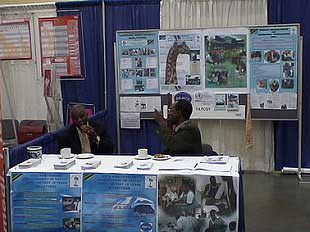 Provost Tumaini University Prof. E. Kessy and Mr. E. Mayo at TATCOT booth
